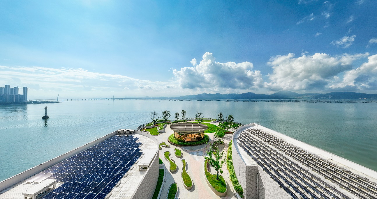 A large building with a large pool and a large building with a large building and a large building with a large building and a large building with a large building and a large building with a large building

Description automatically generated with medium confidence